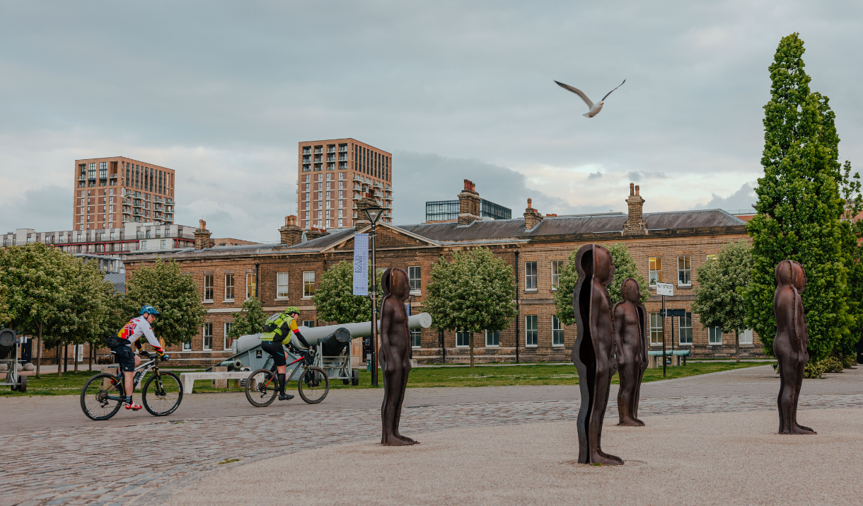 Cyclists on the Thames Path in Woolwich Royal Arsenal